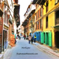 This photo is an area known as the Old Town in Patan, Nepal where one can find old houses and shops.